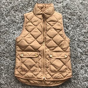 J Crew camel colored puffy vest.